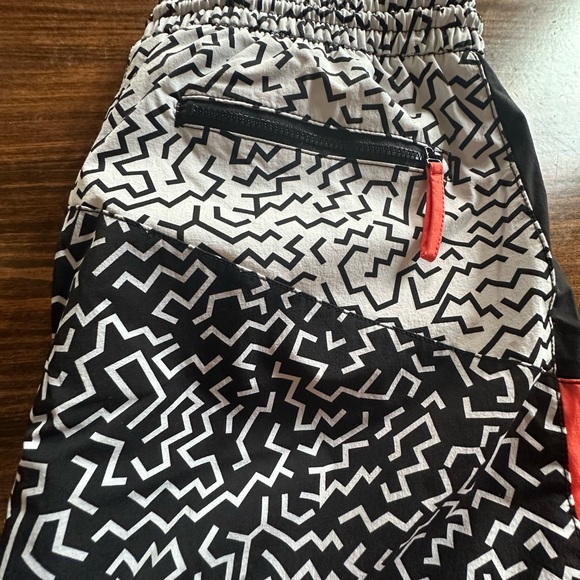 Chubbies Black and White Patterned Athletic Shorts with Red Accents - Picture 5 of 5